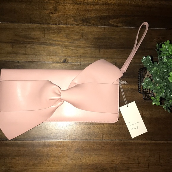 a new day Handbags - NWT A New Day Blush Bow Clutch/Wristlet